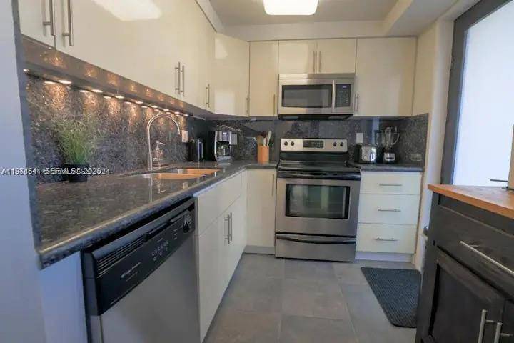 301 Golden Isles DrHallandale Beach - Condo 5+ Stories,Condo condo unit 109 - picture